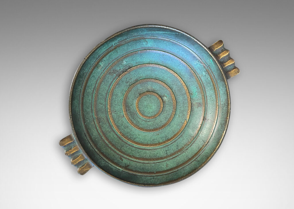 Gallery BAC shallow bowl with handles in verdigris patinated bronze with raised and burnished concentric circles and handle details