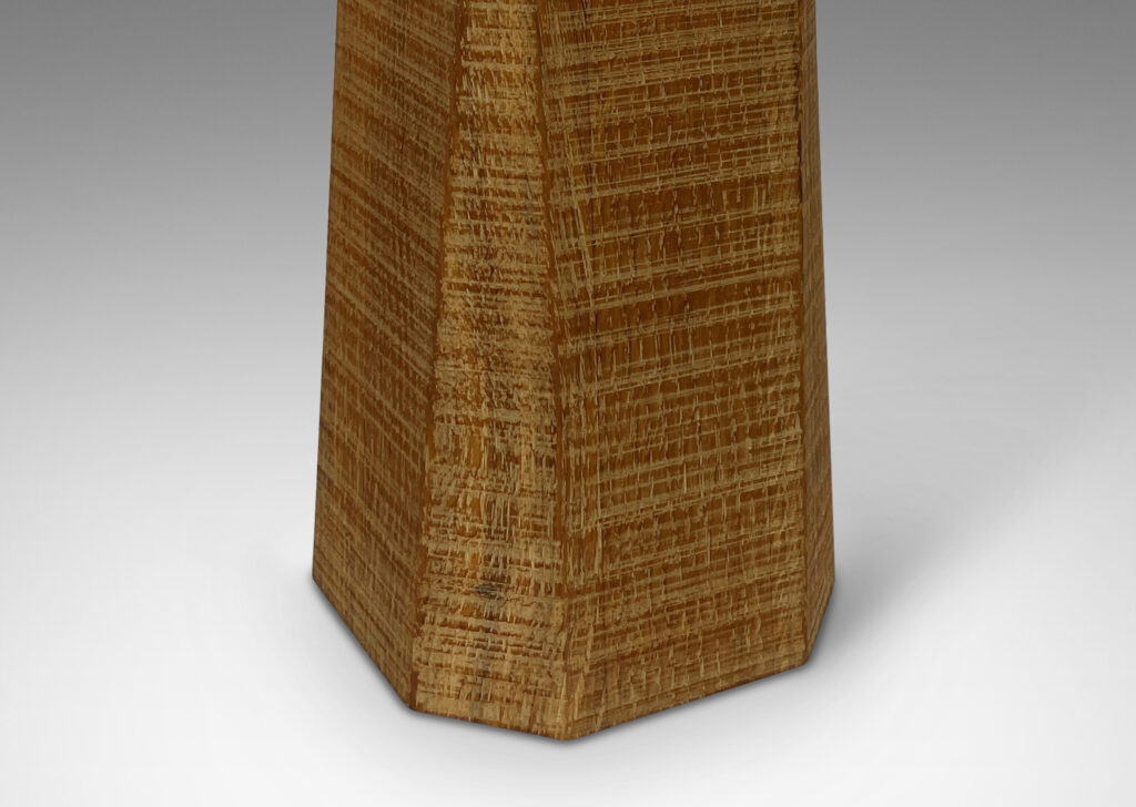 Gallery BAC raked pedestal form in oak, with decorative chiseled texture