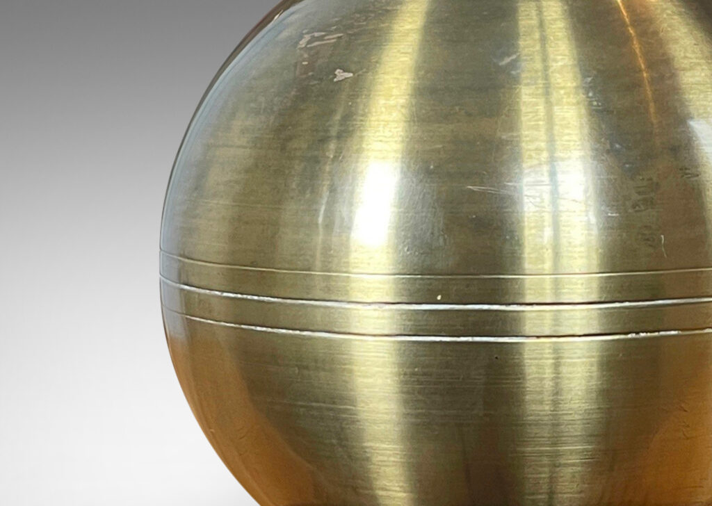 Gallery BAC globe form in brass with disk base