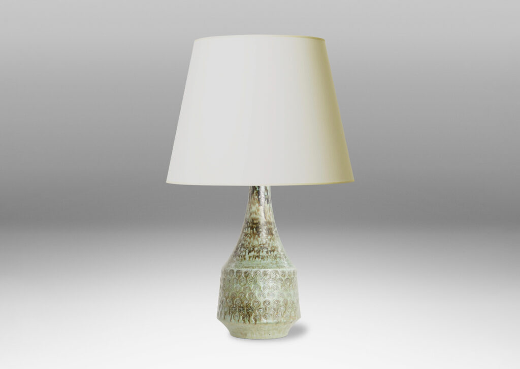 Gallery BAC flared drum form with impressed spiral motifs and a tall sweeping neck