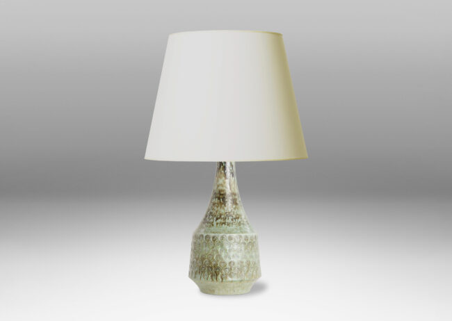 Gallery BAC flared drum form with impressed spiral motifs and a tall sweeping neck