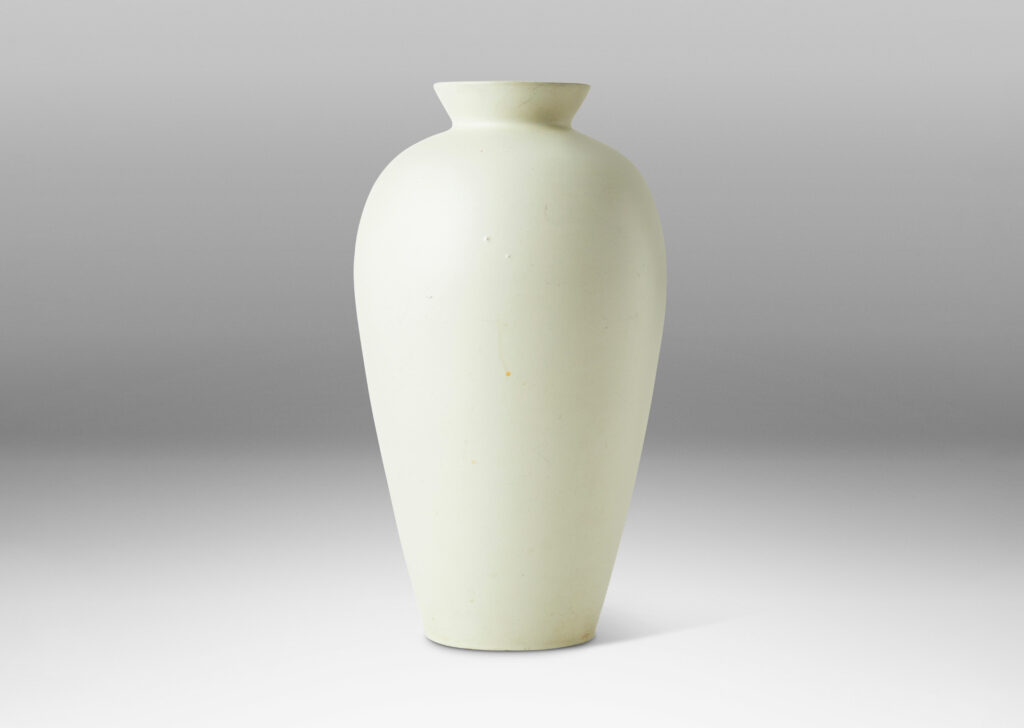 Gallery BAC tall tapering form in a matte pale grayish-ivory glaze