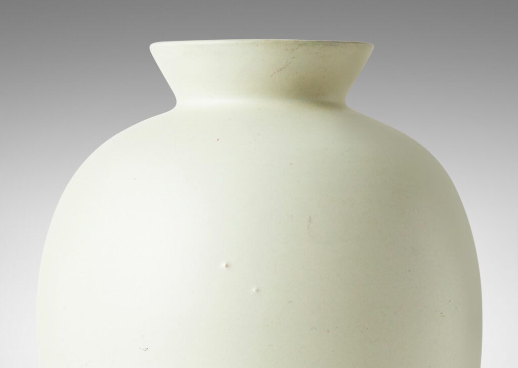 Gallery BAC tall tapering form in a matte pale grayish-ivory glaze