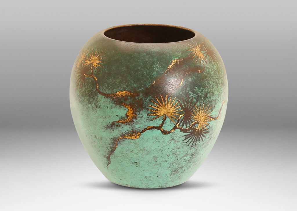 Gallery BAC classic tapered form in verdigris with a black pine design in contrast patination with etched polished touches