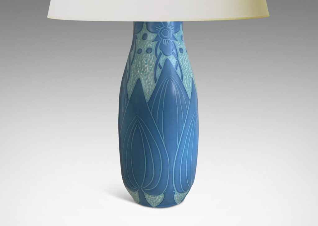 Gallery BAC tall swelling form with carved stylized floral designs in sky and French blue tones