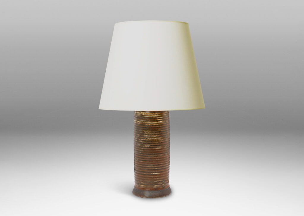 Gallery BAC ridged cylindrical form glazed in a warm brown and pale gray “Sung” glaze with matte brown angled plinth