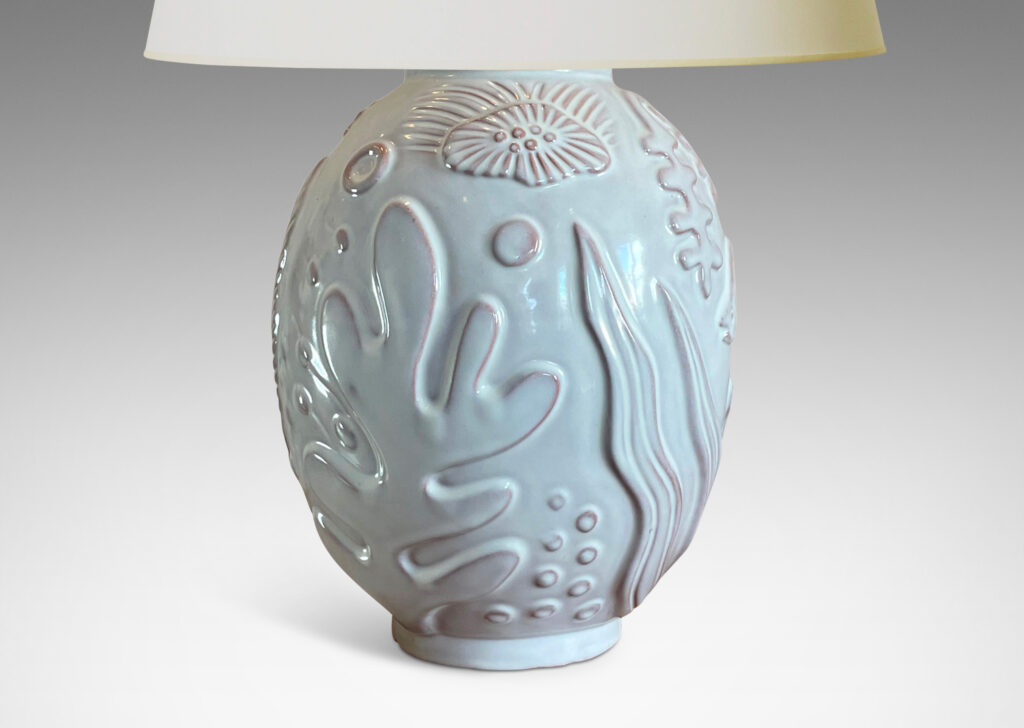 Gallery BAC ovoid form with reliefs depicting marine flora and fauna in a warm eggshell ivory glaze