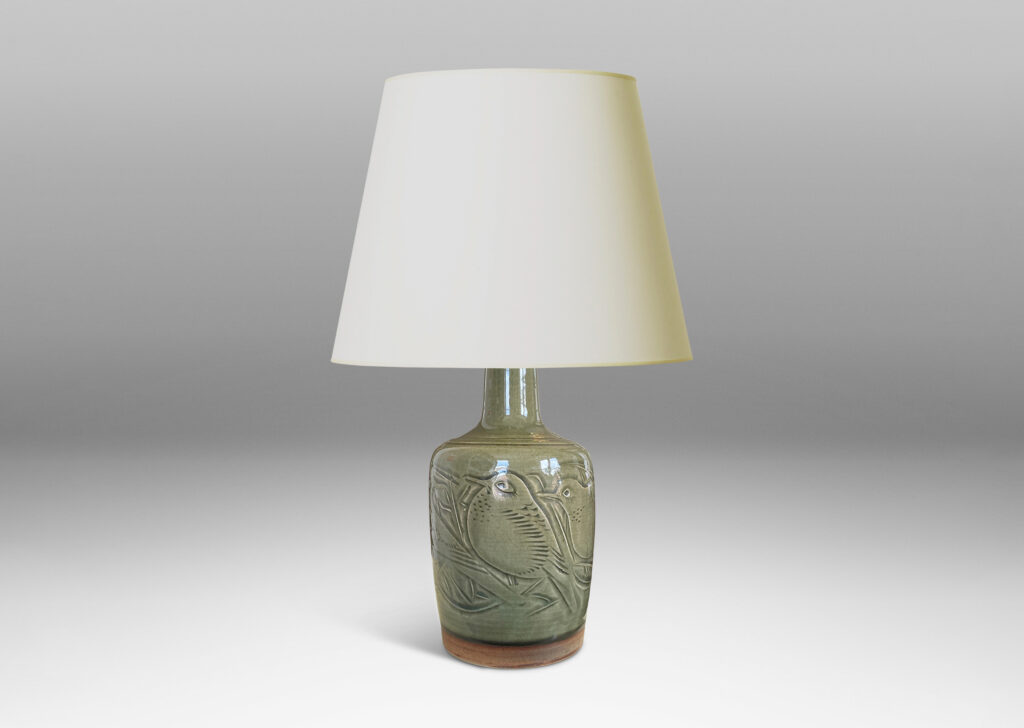 Gallery BAC gently tapered drum form with sprouting neck and beautifully carved reliefs depicting birds, glazed in a deep olive