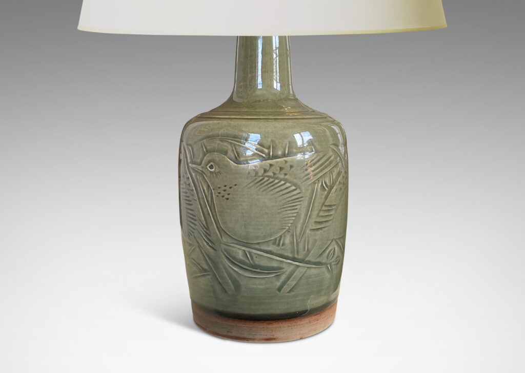 Gallery BAC gently tapered drum form with sprouting neck and beautifully carved reliefs depicting birds, glazed in a deep olive