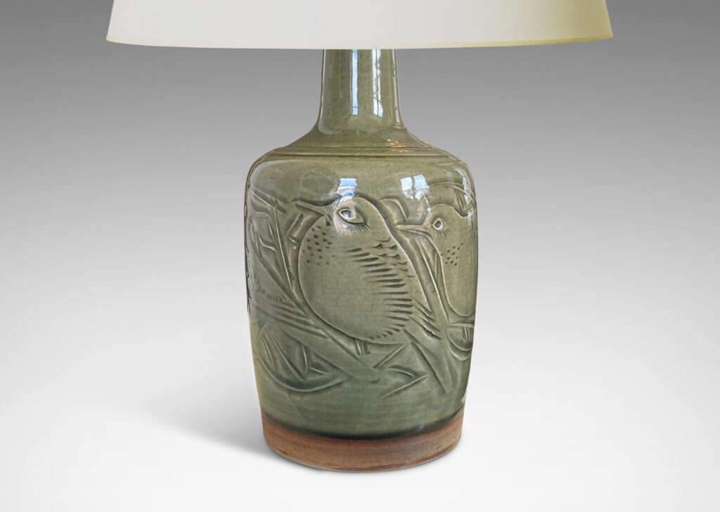 Gallery BAC gently tapered drum form with sprouting neck and beautifully carved reliefs depicting birds, glazed in a deep olive