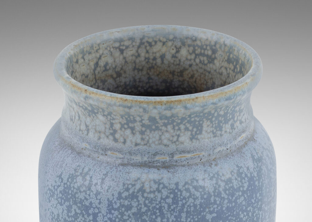 Gallery BAC straight-sided ovoid form with flared mouth, glazed in a soft harefur and dappled light blue glaze