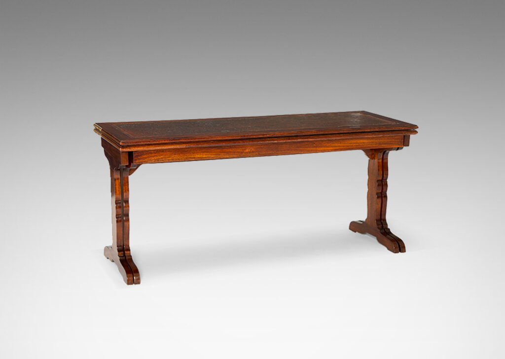 Gallery BAC “tric-trac” folding mechanism that doubles the table’s size, with cut-out style legs in the Regency taste and original leather insets on top