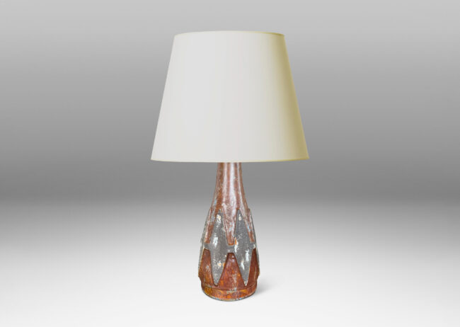 Gallery BAC conical form with relief harlequin ornaments, glazed in dark gray against brown