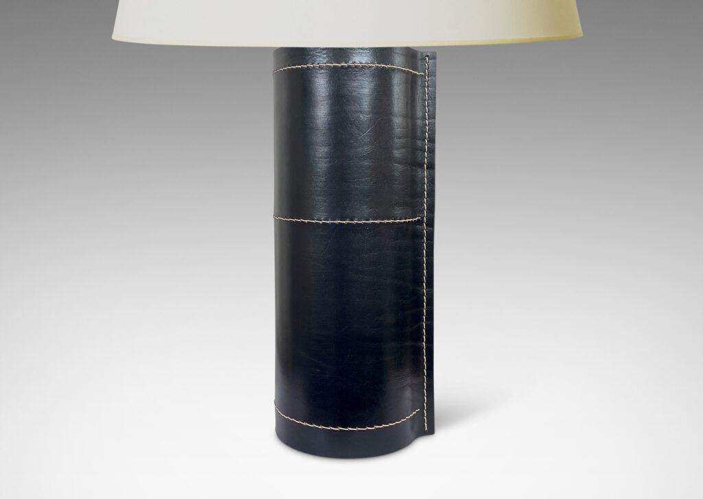 Gallery BAC column form covered in stitched black leather