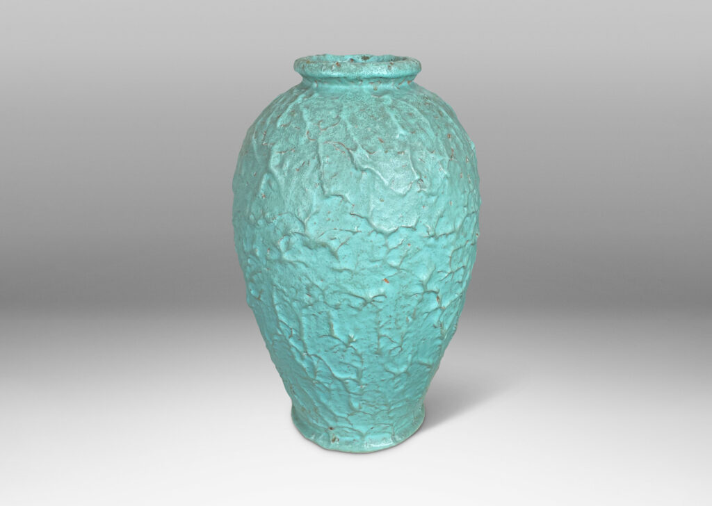 Gallery BAC tapered form with rustic surface texture in a bright celadon glaze;