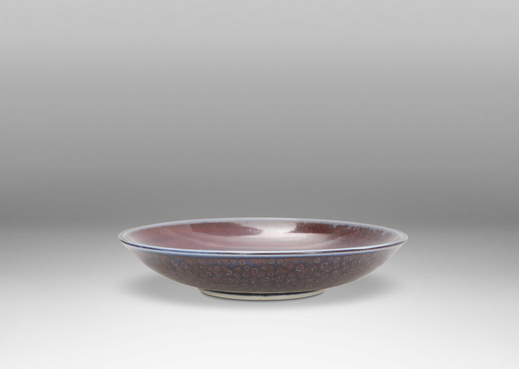 Gallery BAC curved silhouette glazed in a magnificent oxblood tone with touches of light purple