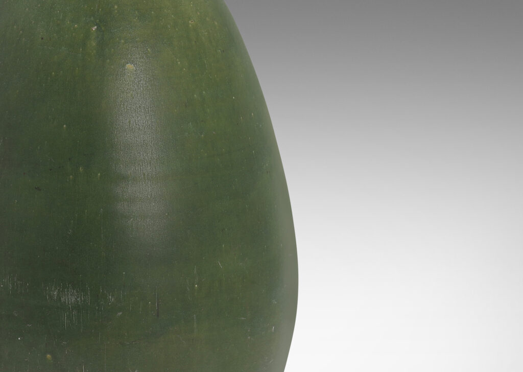 Gallery BAC ovoid form glazed in a saturated deep green tone