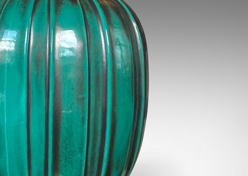 Gallery BAC luted ovoid forms in a saturated green copper-oxide glaze