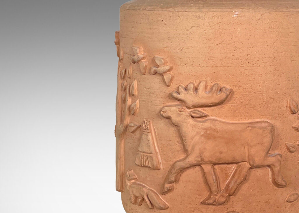 Gallery BAC wide cylindrical form with reliefs depicting outdoorsy scenes, including trees, animals, and sportsmen