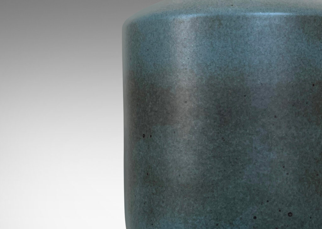 Gallery BAC plump cylindrical form with curved taper at the base, glazed in gray-blue with airy dark gray touches