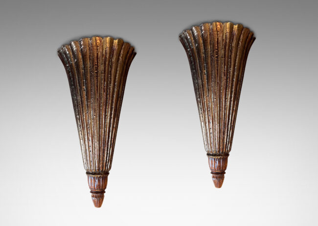 Gallery BAC flaring lobed palmate forms with reeded brackets at bases; hand-crafted in wood with carved details