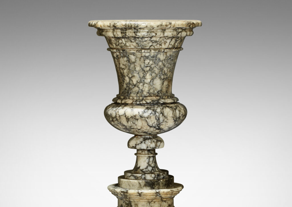 Gallery BAC urn on an engaged pedestal base; turned marble