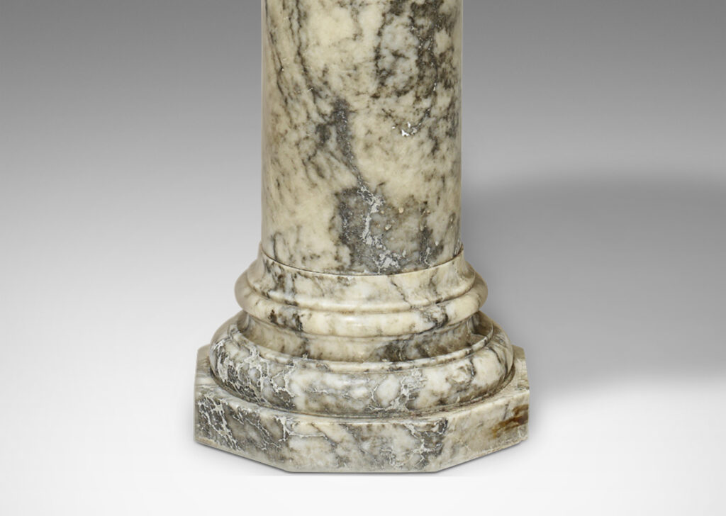 Gallery BAC urn on an engaged pedestal base; turned marble