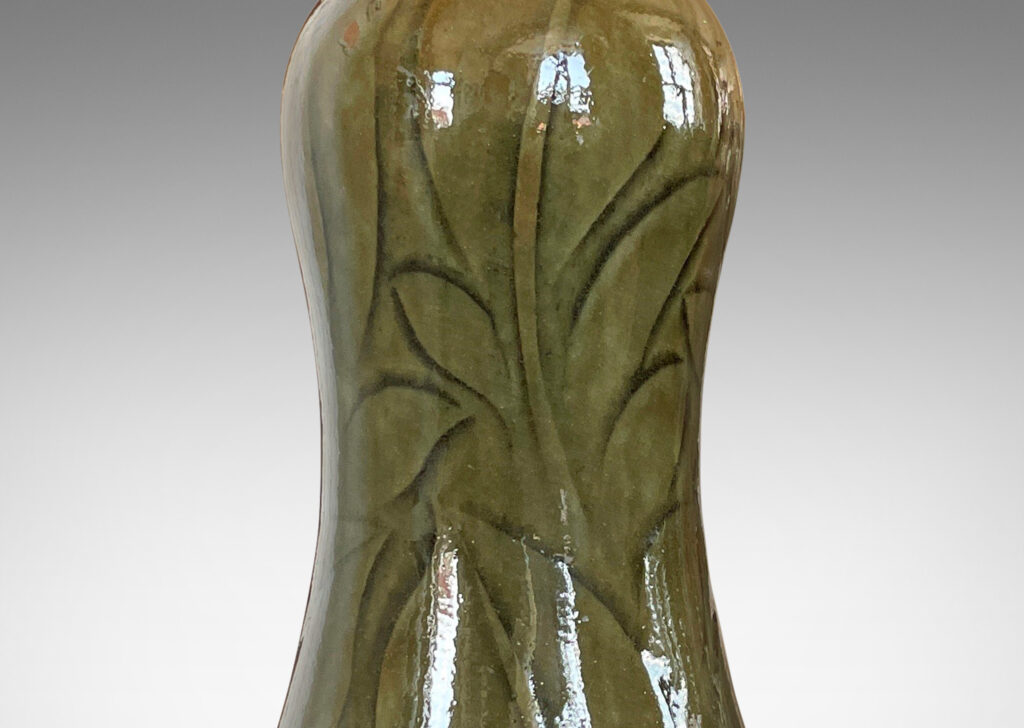 Gallery BAC elongated double gourd form with carved intaglio pattern of lush tropical foliage