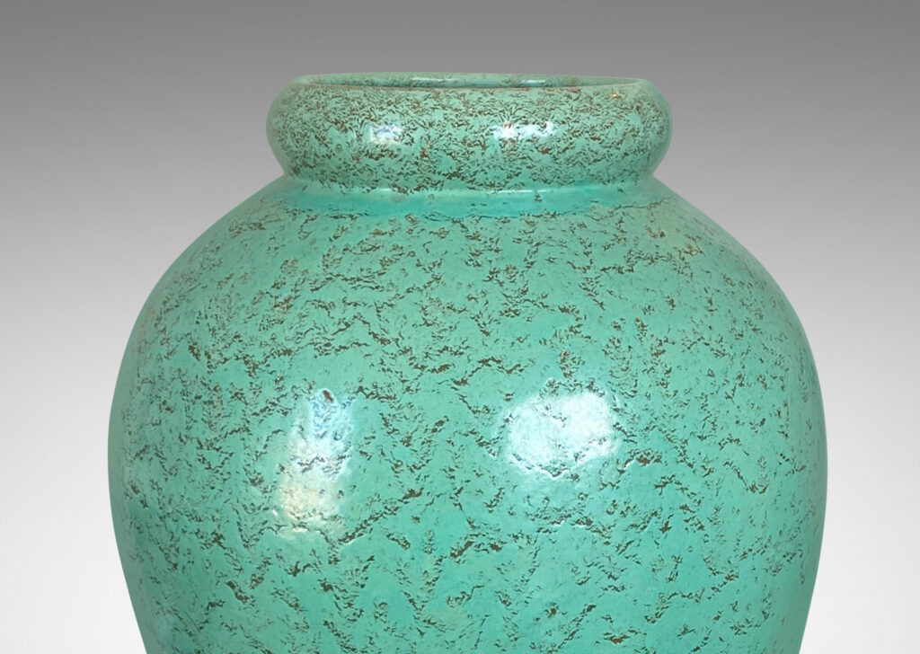 Gallery BAC tall tapered forms, glazed in a bright celadon green