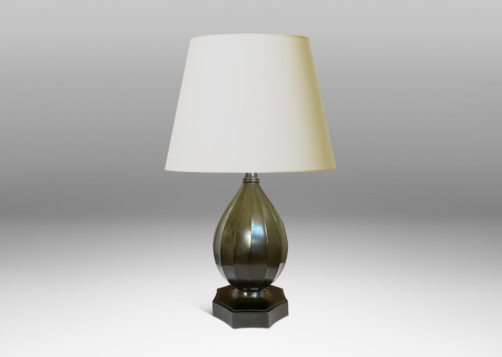 Gallery BAC fluted organic drop form on an octagonal base with coved sides; Disko alloy with bronze finish