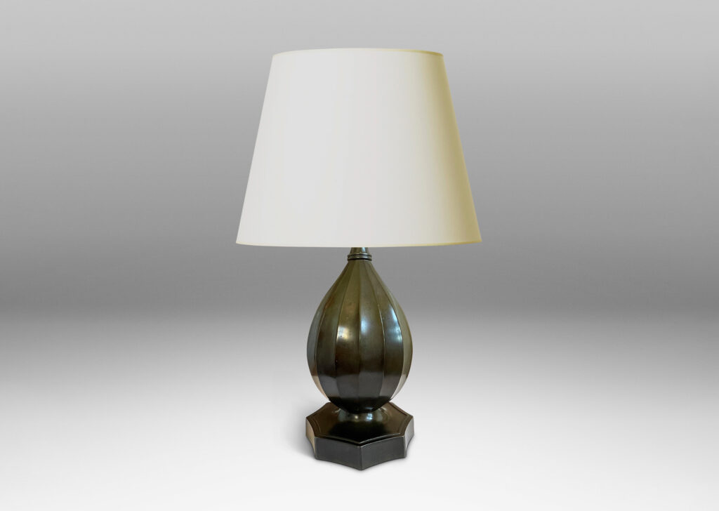 Gallery BAC fluted organic drop form on an octagonal base with coved sides; Disko alloy with bronze finish