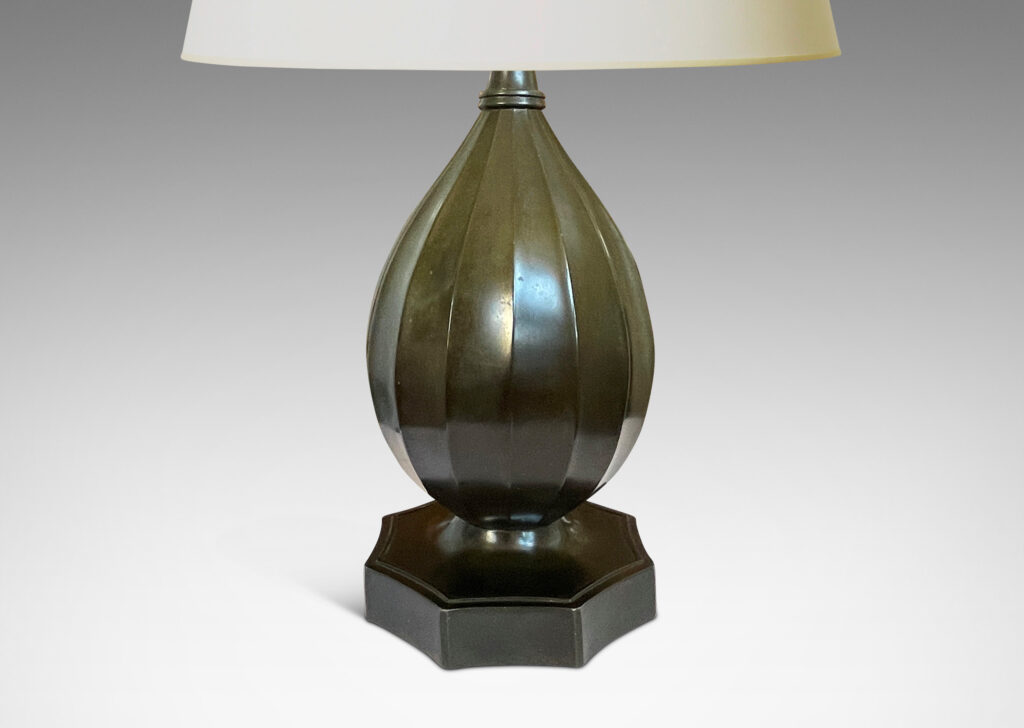 Gallery BAC fluted organic drop form on an octagonal base with coved sides; Disko alloy with bronze finish