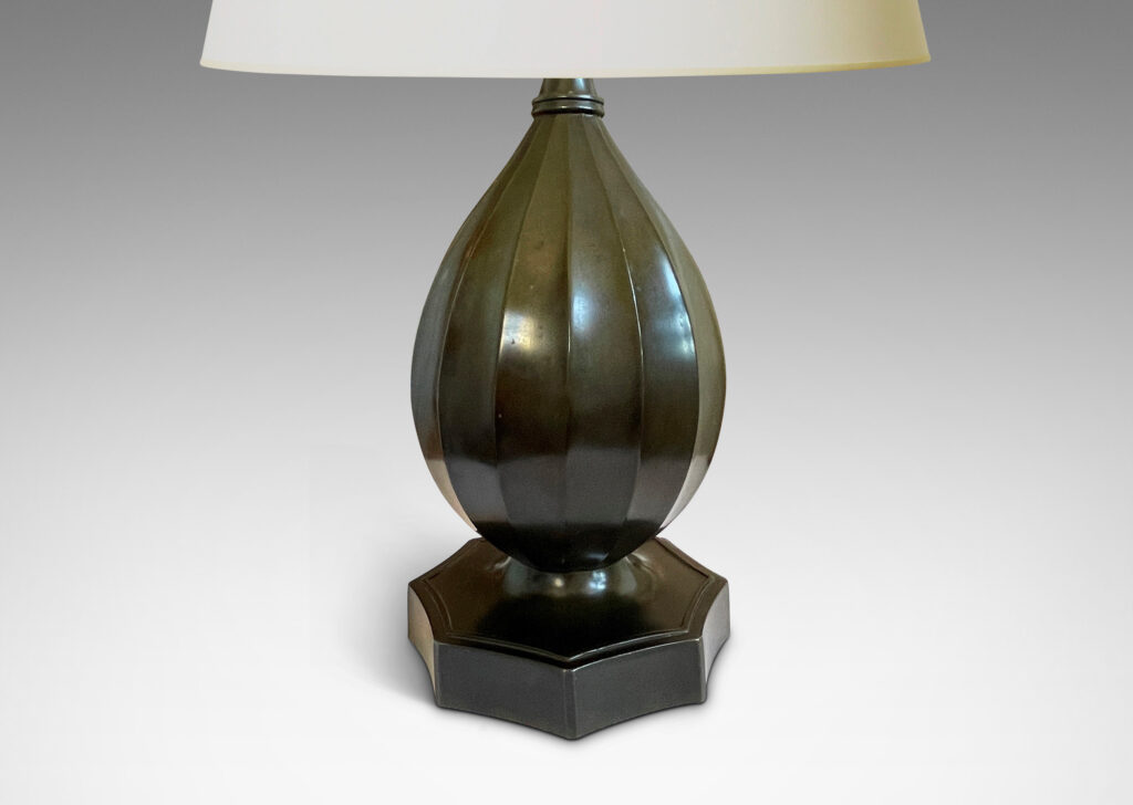 Gallery BAC fluted organic drop form on an octagonal base with coved sides; Disko alloy with bronze finish