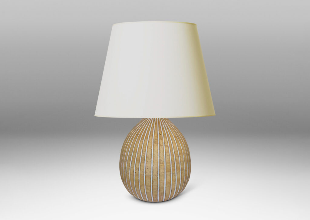 Gallery BAC bulbous form in an unglazed sandy tone, with carved vertical pinstripes glazed gloss white