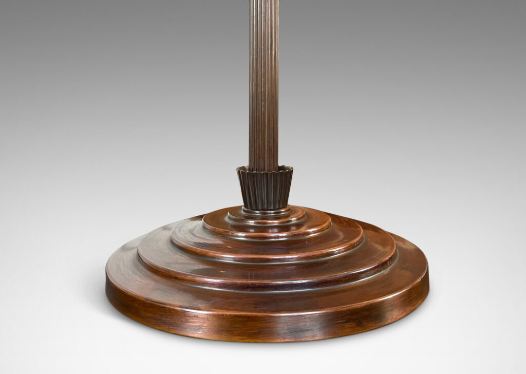 Gallery BAC wide stepped base with reeded stand and cuff detail; patinated bronze