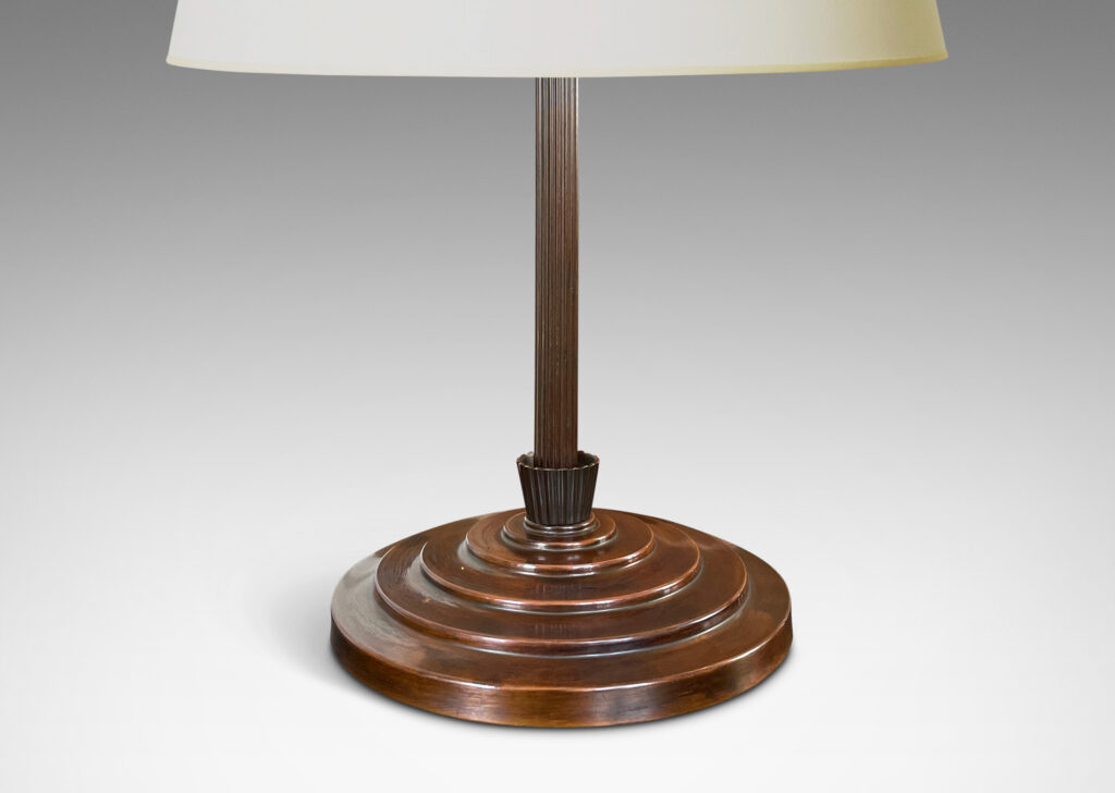 Gallery BAC wide stepped base with reeded stand and cuff detail; patinated bronze