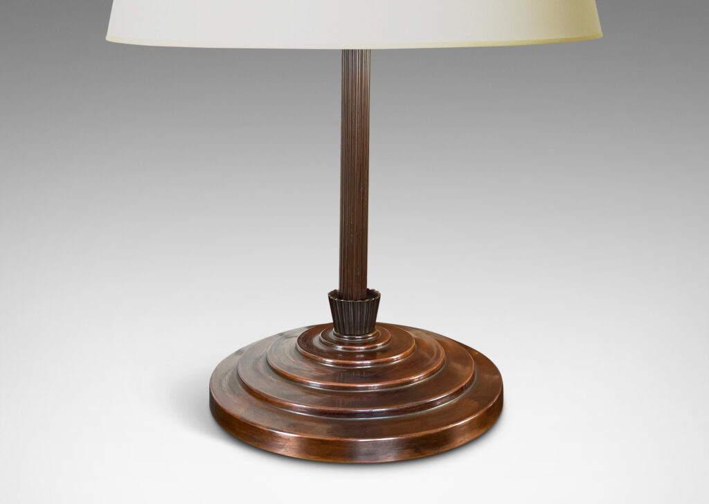 Gallery BAC wide stepped base with reeded stand and cuff detail; patinated bronze