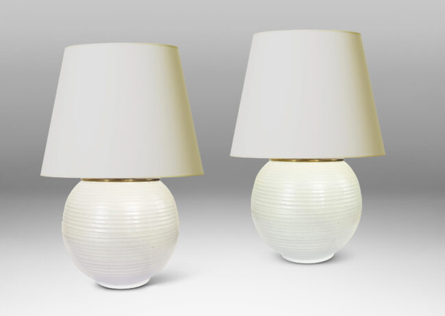 Gallery BAC plump globe forms with horizontal ridges, glazed in an eggshell finish ivory