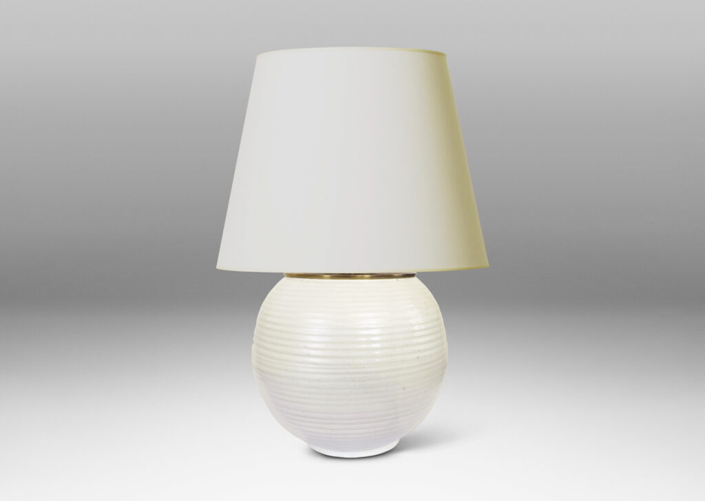 Gallery BAC plump globe forms with horizontal ridges, glazed in an eggshell finish ivory