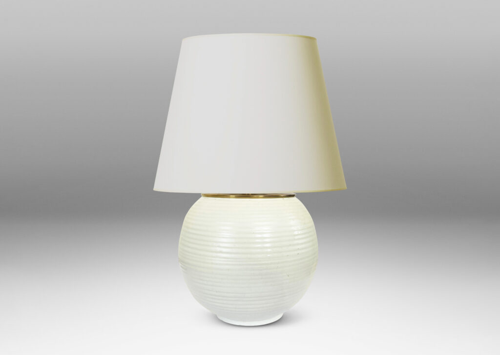 Gallery BAC plump globe forms with horizontal ridges, glazed in an eggshell finish ivory