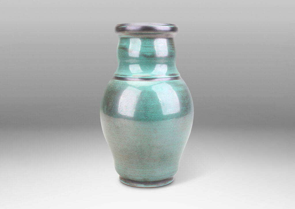 Gallery BAC undulating form with wide mouth, in a teal and gunmetal luster copper oxide glaze