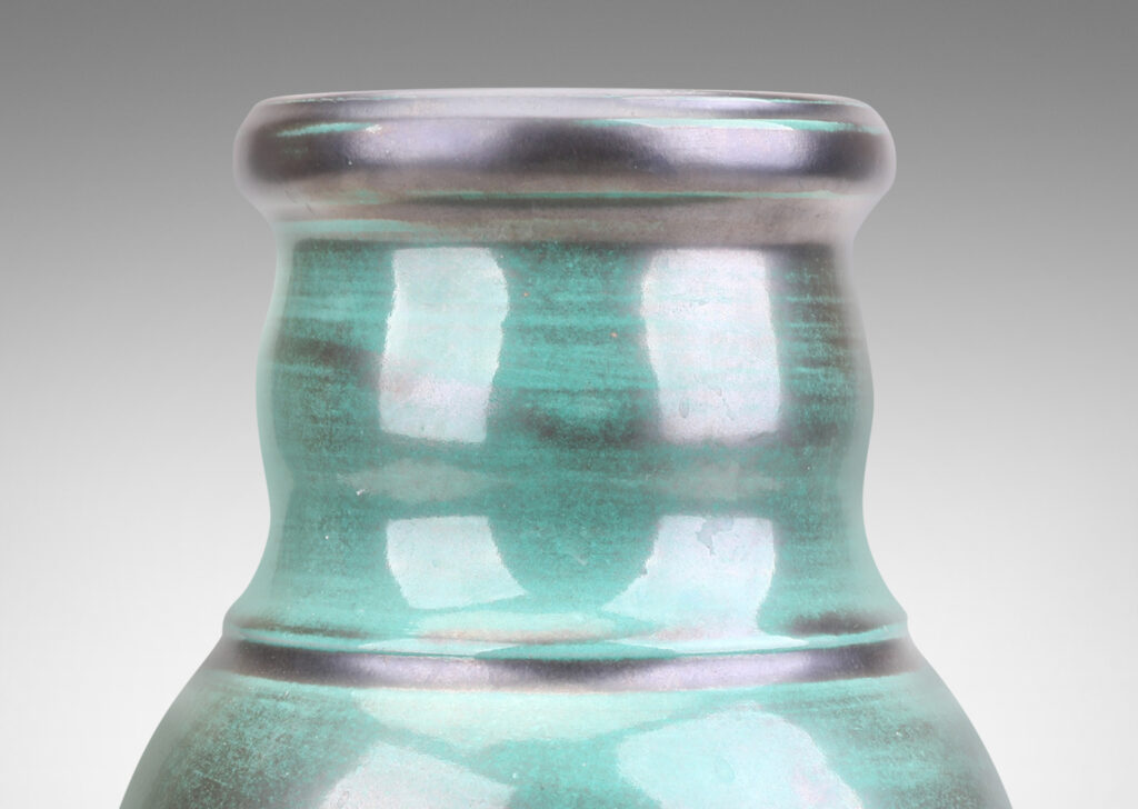 Gallery BAC undulating form with wide mouth, in a teal and gunmetal luster copper oxide glaze