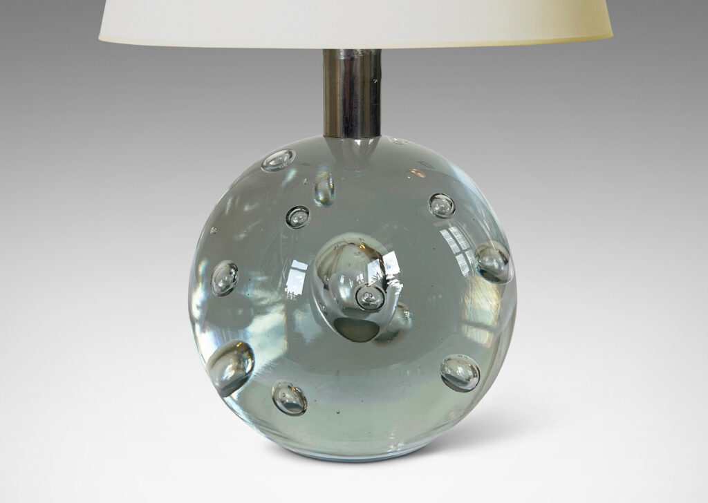 Gallery BAC spherical form in glass with engaged bubbles and a steel stem