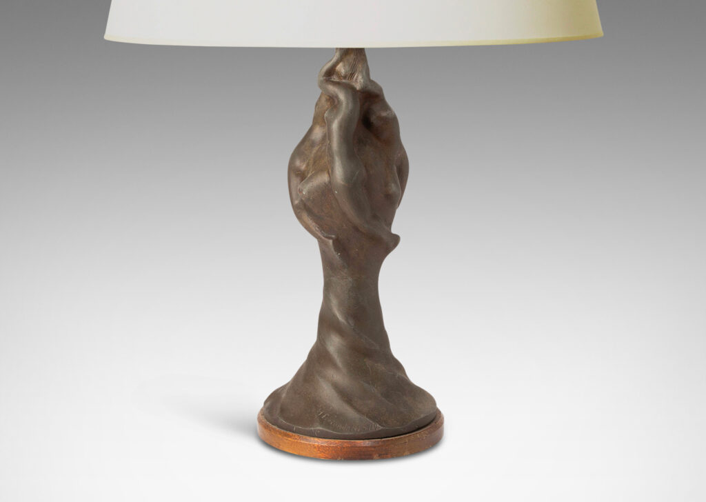 Gallery BAC swirling, torch-like form with engaged female figures; patinated bronze with a wood base