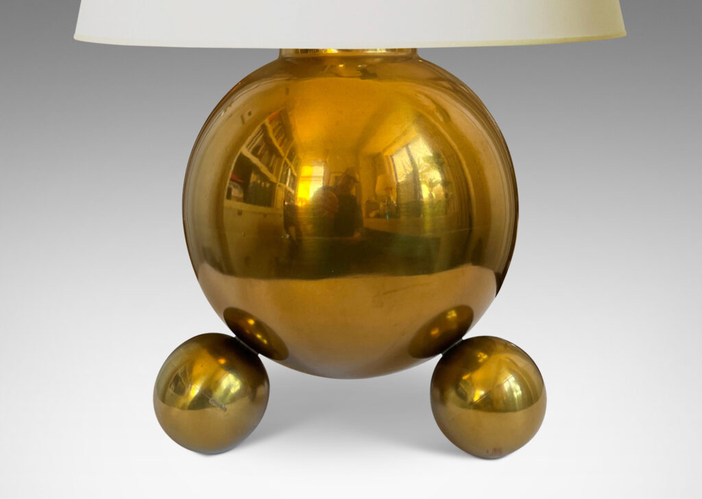 Gallery BAC globe forms perched on trios of smaller spheres; brass