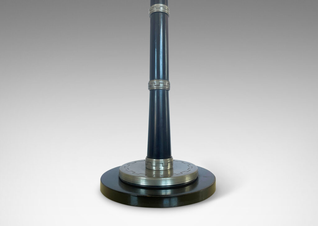 Gallery BAC gently tapered black lacquered stand and disk base, with ring and disk mounts engraved with Greek meander ornaments