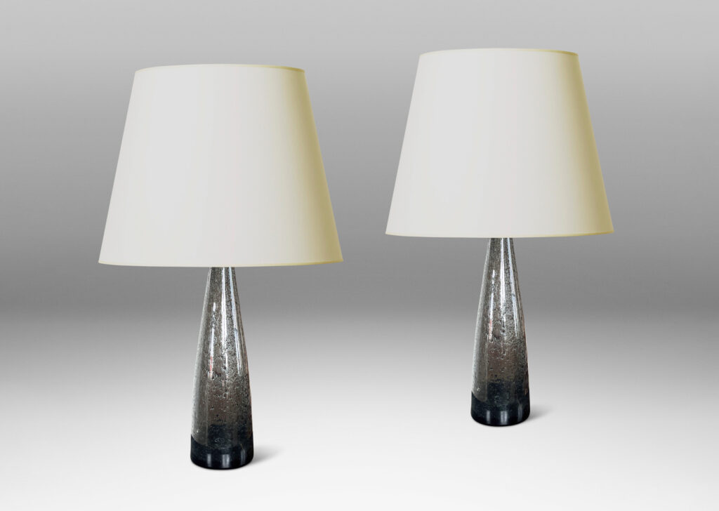 Gallery BAC having tall conical forms in hand-blown dark gray glass