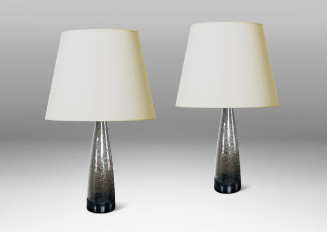 Gallery BAC having tall conical forms in hand-blown dark gray glass