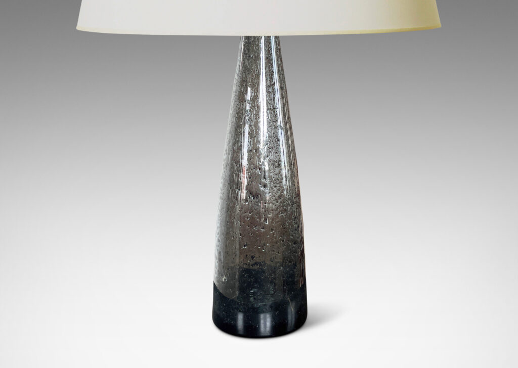 Gallery BAC having tall conical forms in hand-blown dark gray glass