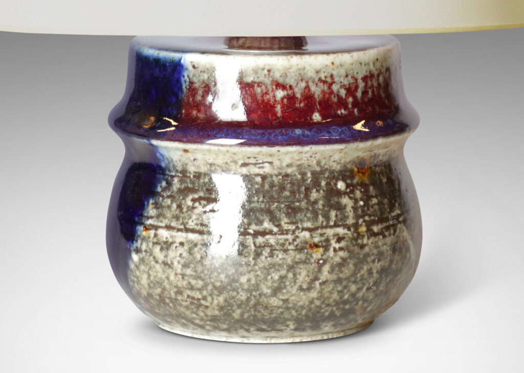 Gallery BAC organically modeled form glazed in oxblood burgundy, violet and pale gray